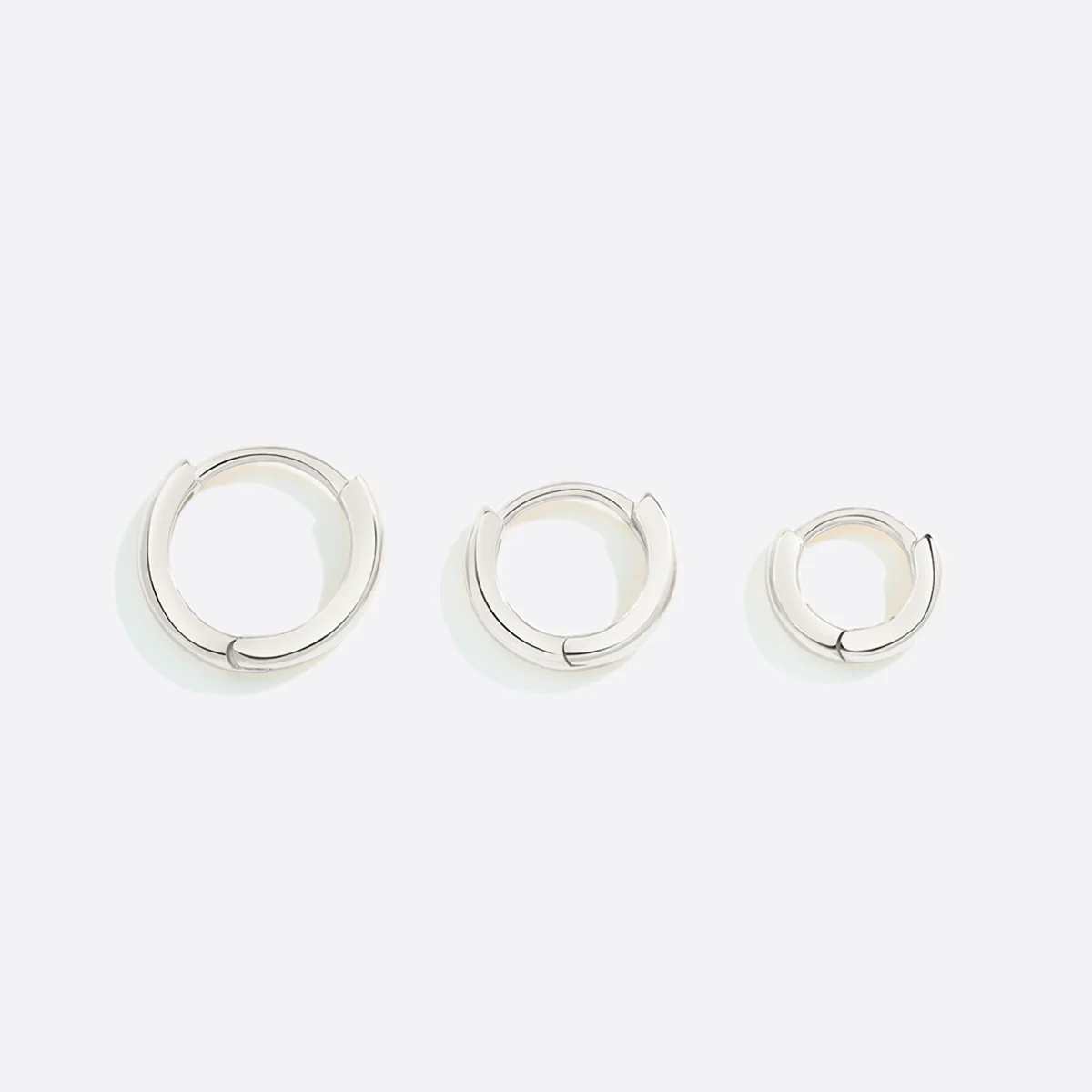 Dainty Huggie Hoop Earrings - Image 10