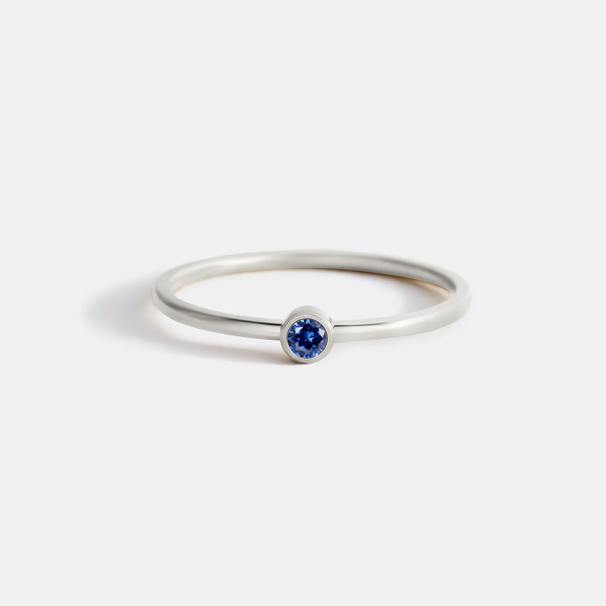 Minimalist Bezel-Set September Birthstone Stacking Band - Image 6