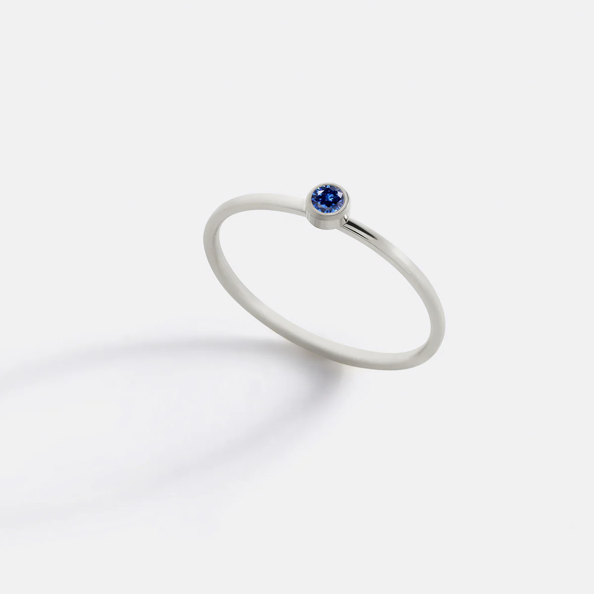 Minimalist Bezel-Set September Birthstone Stacking Band - Image 7